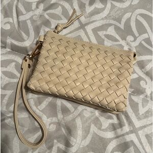 Charming Charlie cream wristlet